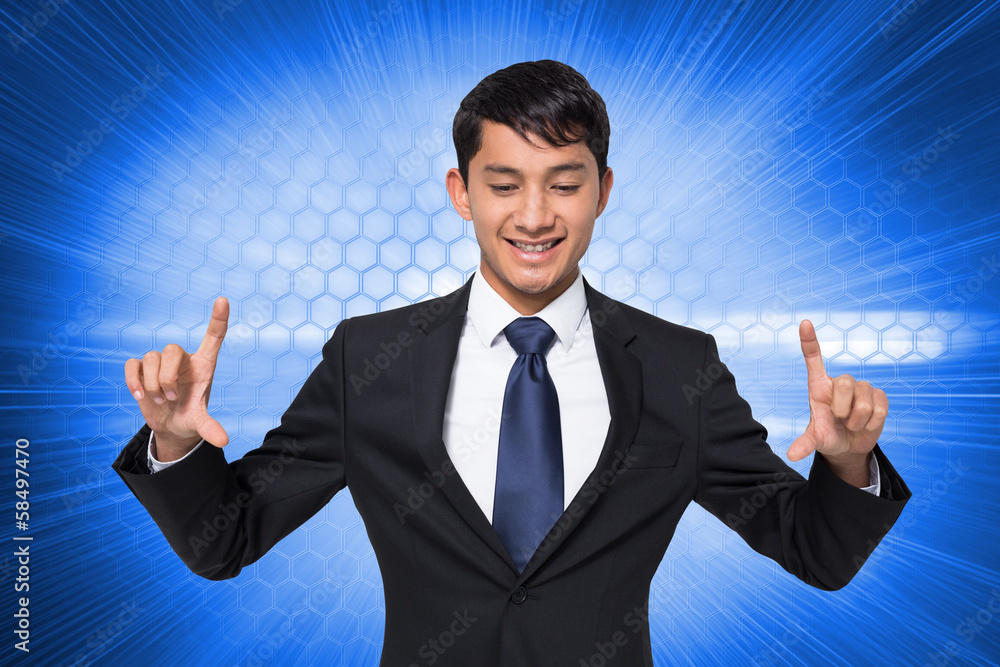 Composite image of smiling businessman holding Composite image of smiling businessman holding