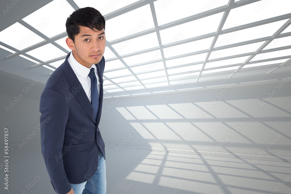 Composite image of unsmiling casual businessman walking Composite image of unsmiling casual businessman walking