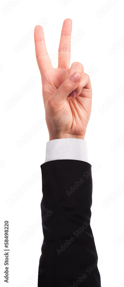 Hand showing the sign of victory and peace Hand showing the sign of victory and peace