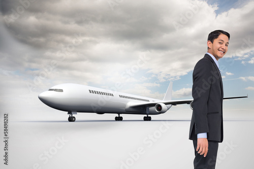 Composite image of smiling asian businessman © WavebreakMediaMicro