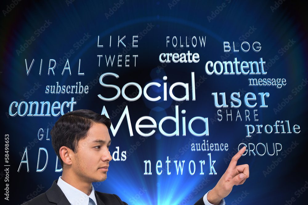 Composite image of stern asian businessman pointing Composite image of stern asian businessman pointing