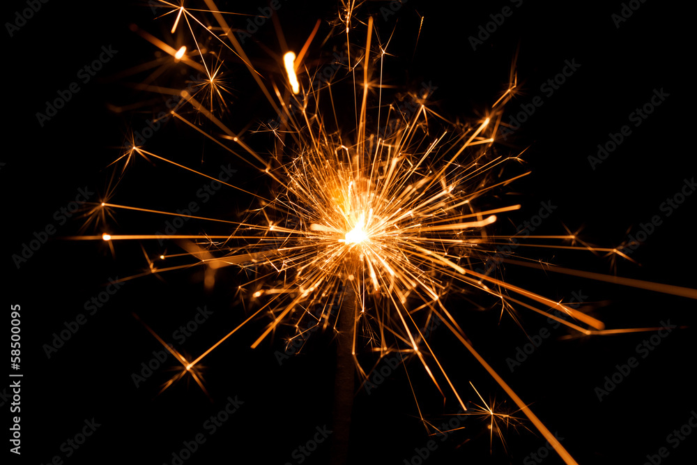Christmas sparkler on black background. Bengal fire Christmas sparkler on black background. Bengal fire