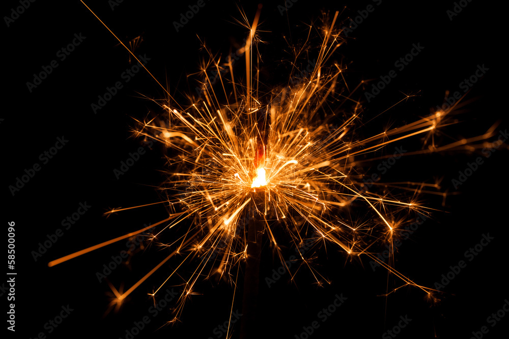 Christmas sparkler on black background. Bengal fire Christmas sparkler on black background. Bengal fire