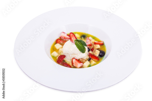 fruit soup with berries and ice-cream