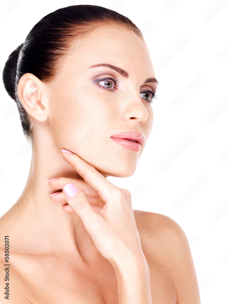 young pretty white woman with hand at chin young pretty white woman with hand at chin
