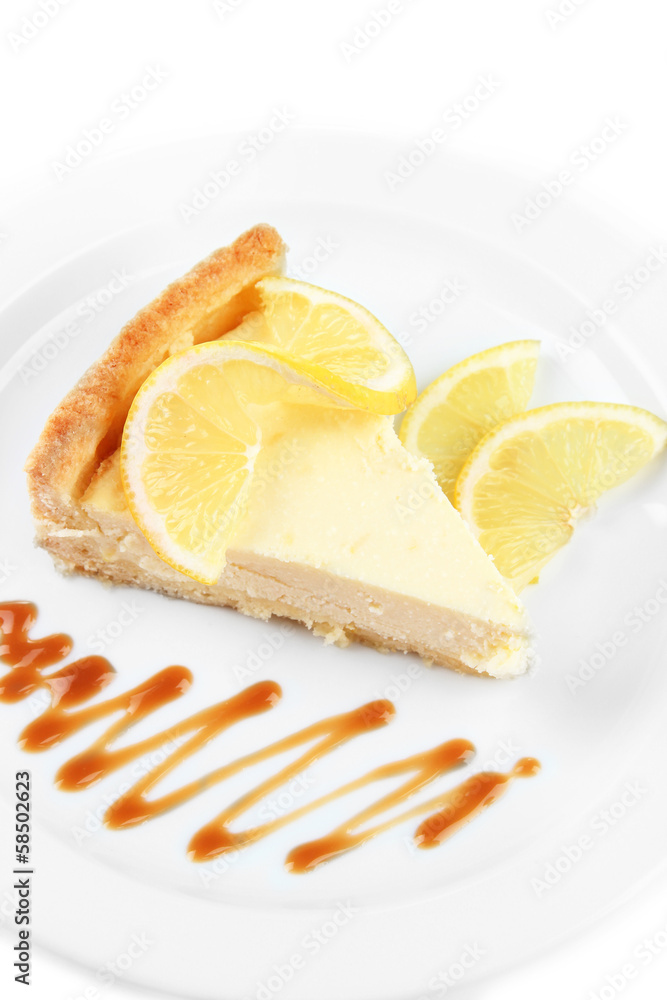 Slice of lemon cheesecake and sauce Slice of lemon cheesecake and sauce