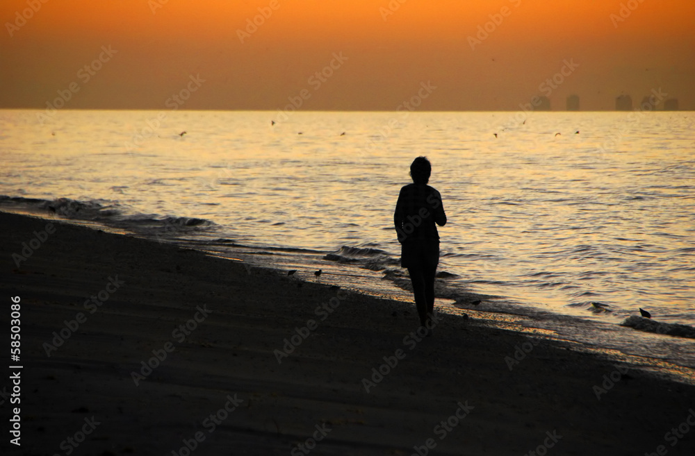 Woman Silhouette at Beach Sunrise Sanibel Florida
