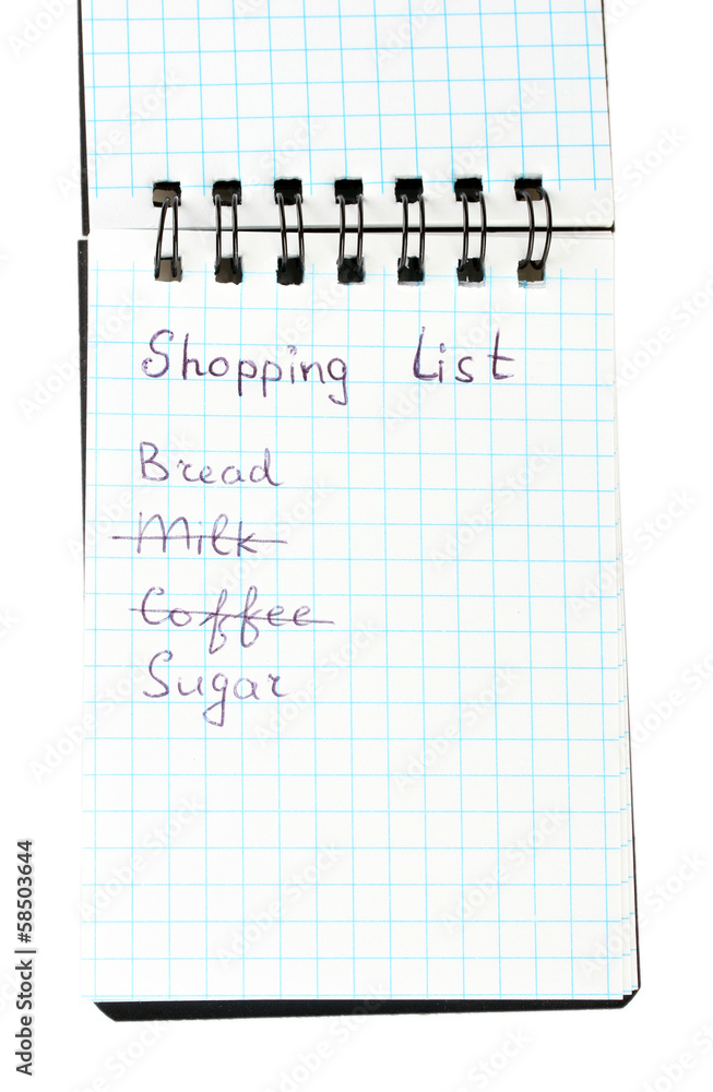 shopping list in a notebook on white background close-up shopping list in a notebook on white background close-up