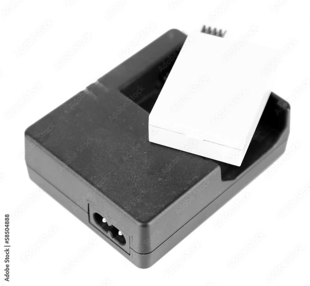 Charger and battery isolated on white Charger and battery isolated on white