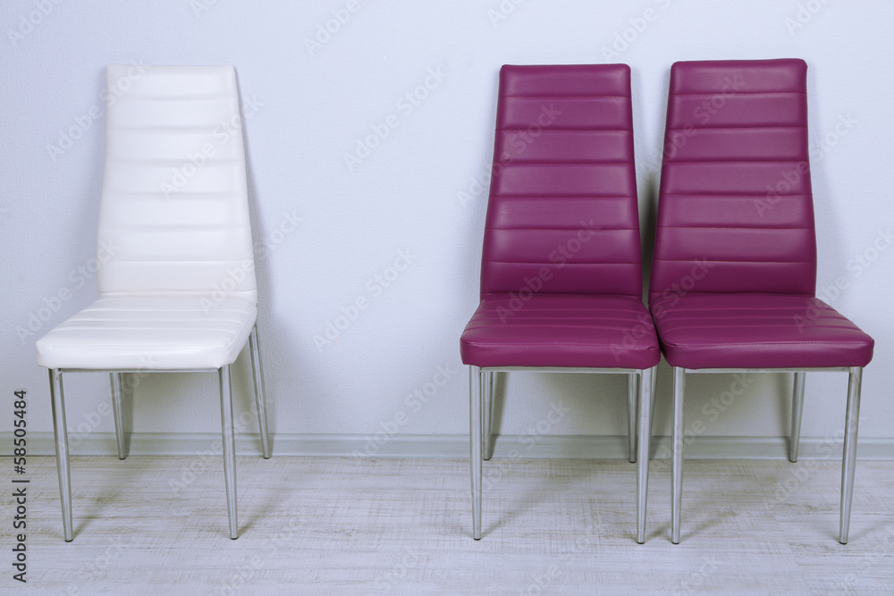 Obraz premium Modern color chairs on wall background