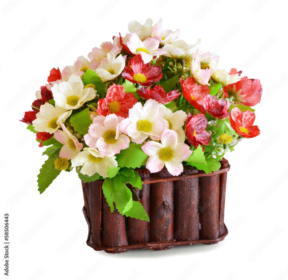 artificial flowers in basket isolate on white