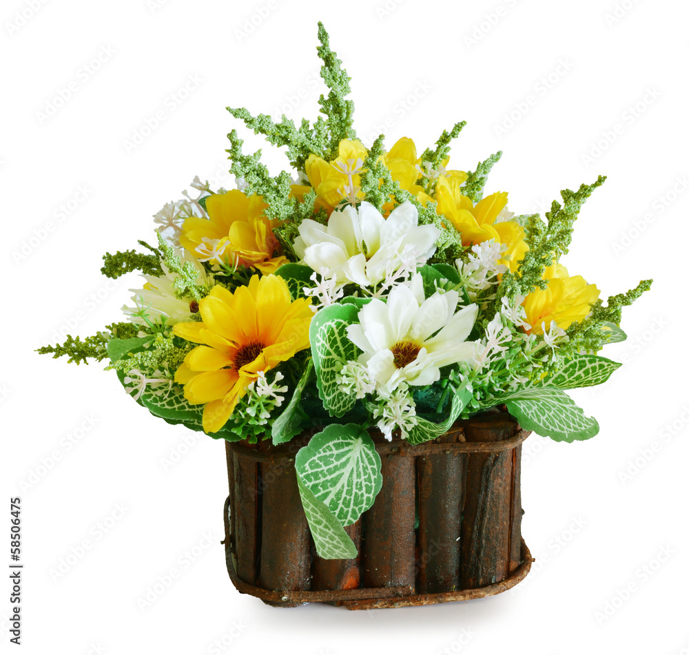 Naklejka premium artificial flowers in basket isolate on white