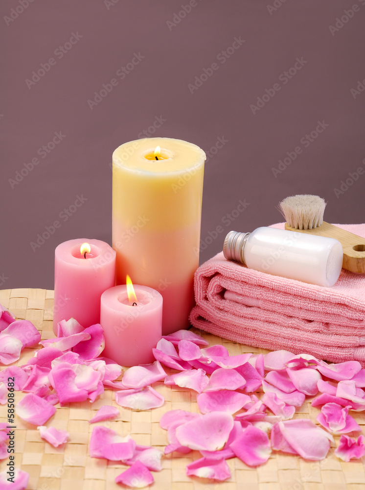 Spa Candles and rose Petals on mat