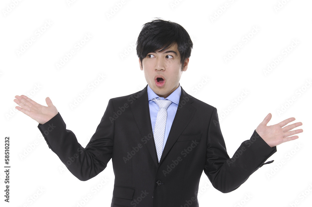 Young businessman lifting arms in excitement Young businessman lifting arms in excitement