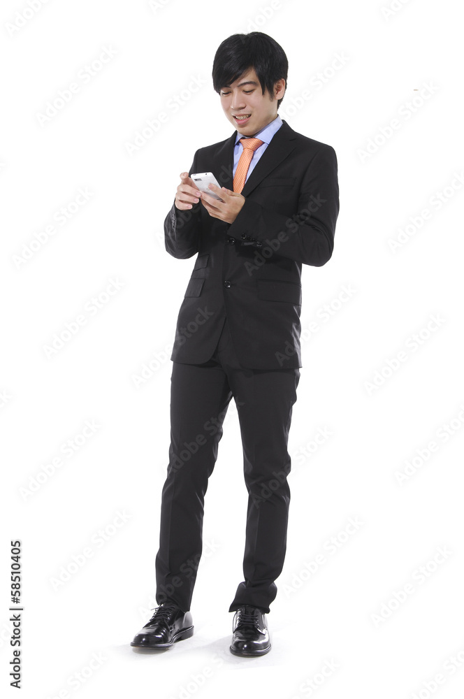handsome young business asian man using cell phone handsome young business asian man using cell phone