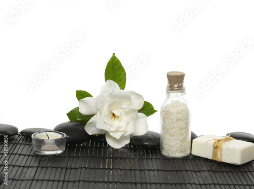 Still life with white gardenia flowers  candle  towel