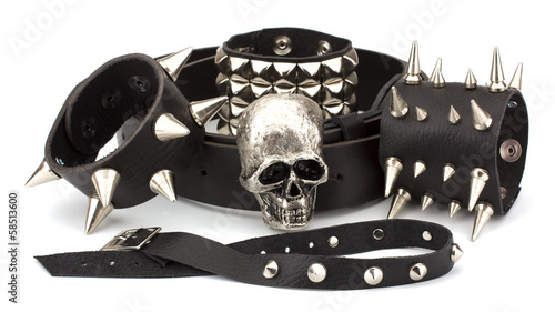 Rock style leather belt and bracelet isolated on white backgroun