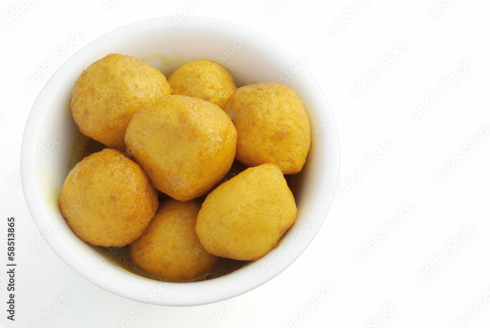 top view curry flavor fish balls in bowl with clipping path top view curry flavor fish balls in bowl with clipping path