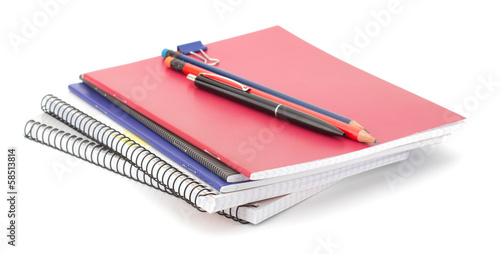 Notebook stack and pencils. Education and studies accessories.