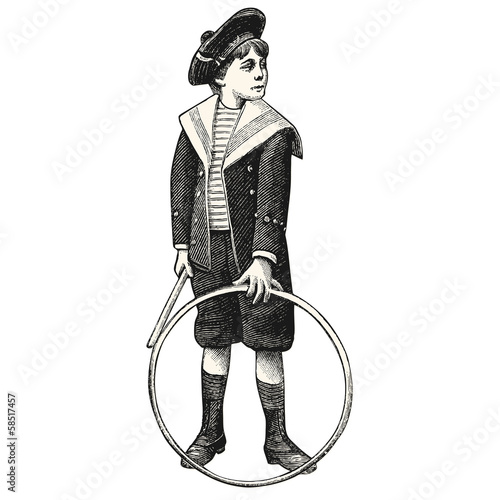Garçon avec son cerceau