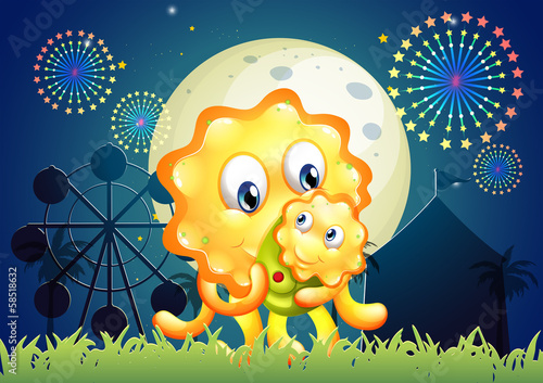 A monster carrying her child at the carnival