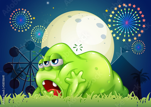 A sleepy green monster at the amusement park