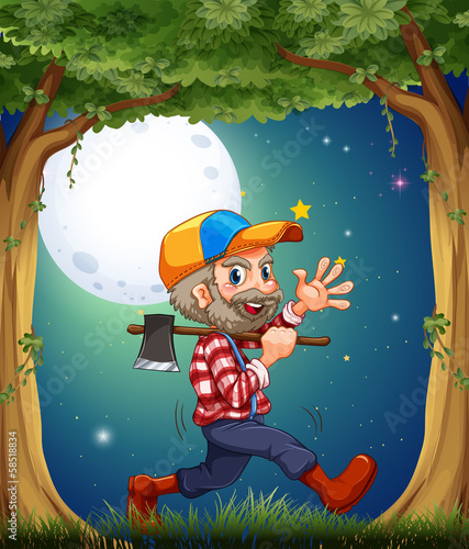 A happy and hardworking woodman walking at the forest