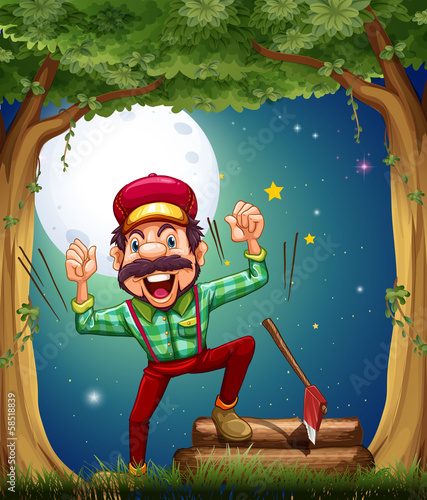 A very cheerful lumberjack at the forest