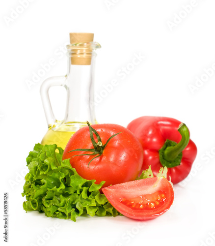 sunflower oil in a bottle with vegetables