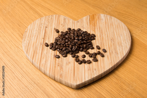 Dark Coffee Beans on Heart Shaped Chopping Board