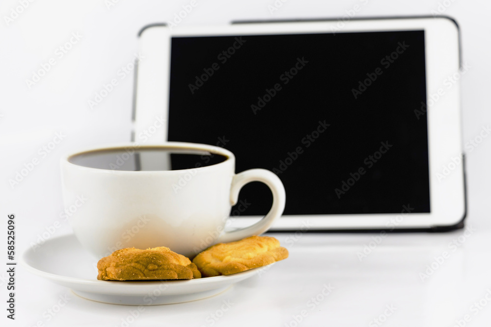 cup of coffee with cookie and tablet computer isolated on white cup of coffee with cookie and tablet computer isolated on white