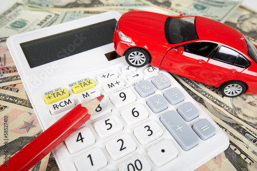 Car money and calculator. photo