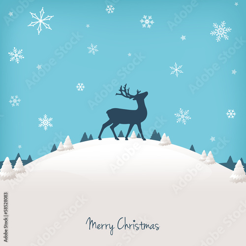 reindeer on a hill in a snowy night