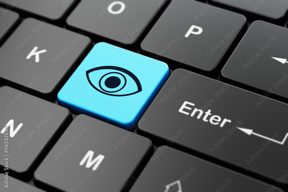 Privacy concept: Eye on computer keyboard background Privacy concept: Eye on computer keyboard background