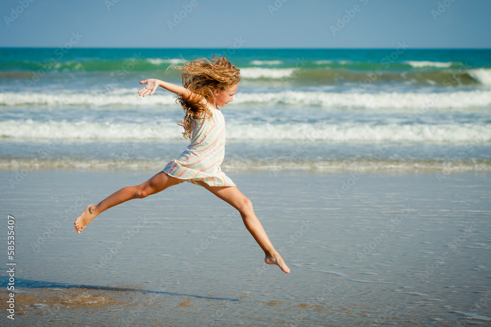 flying jumping beach girl at blue sea shore in summer vacation i flying jumping beach girl at blue sea shore in summer vacation i