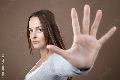 Woman giving hand stop sign