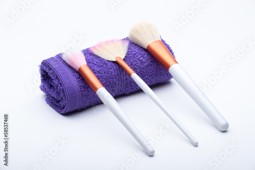 Makeup Brushes on purple towel