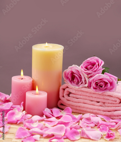 spa set with rose and candle on mat