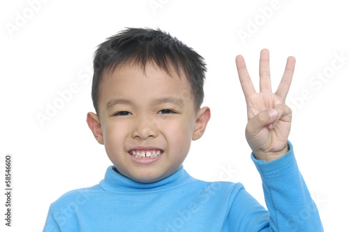 Cute boy and showing three finger isolated