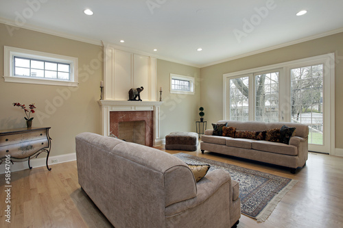 Family room with marble fireplace
