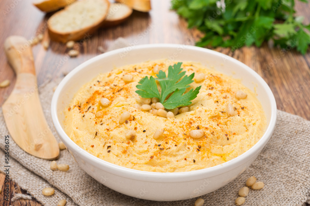 Hummus with pine nuts, horizontal Hummus with pine nuts, horizontal