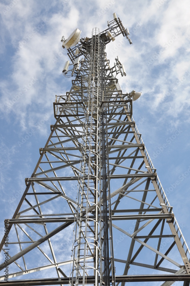 Telecommunication tower against the blue sky Telecommunication tower against the blue sky