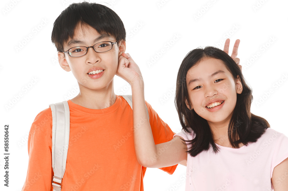 happy smiling brother and sister showing victory hand sign happy smiling brother and sister showing victory hand sign