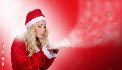 Santa Claus woman blows stars