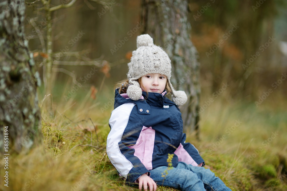 Adorable girl having fun on late autumn Adorable girl having fun on late autumn