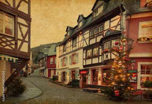 Christmas Eve in Bernkastel-Kues, Germany. Photo in retro style.