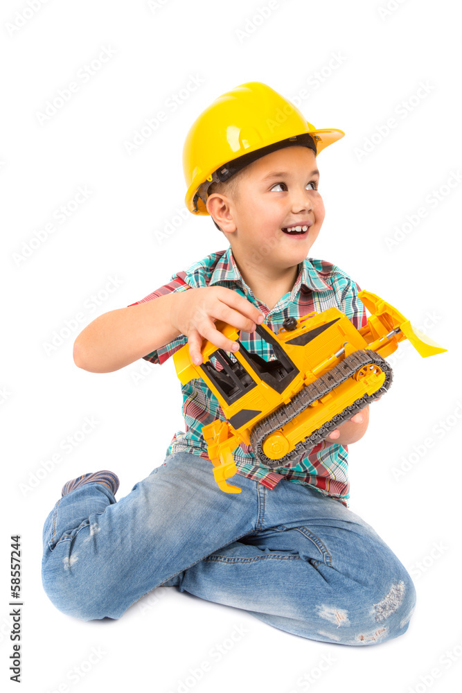 little boy plays with toy tractor little boy plays with toy tractor
