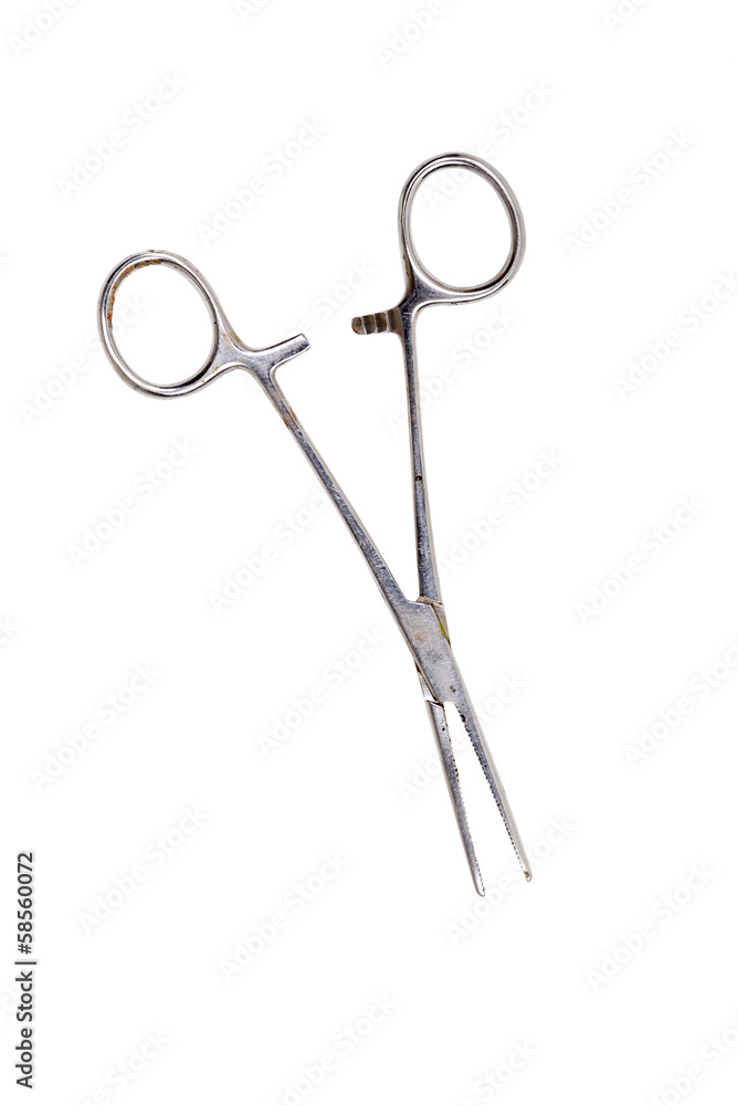 an old used medical clamp scissors, isolated on white an old used medical clamp scissors, isolated on white