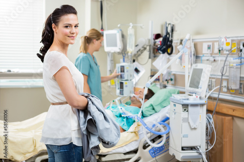 Beautiful Woman With Nurse Examining Patient