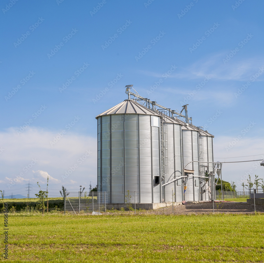 beautiful silver silos in landscape beautiful silver silos in landscape